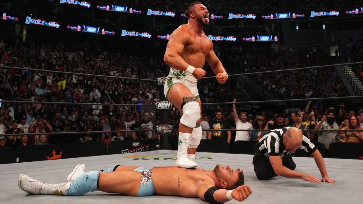 Wardlow standing over a defeated MJF